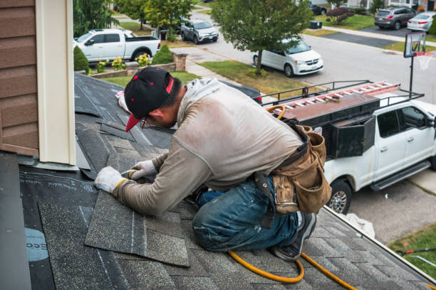 Professional Roof Replacement technician working in Dundee, OR